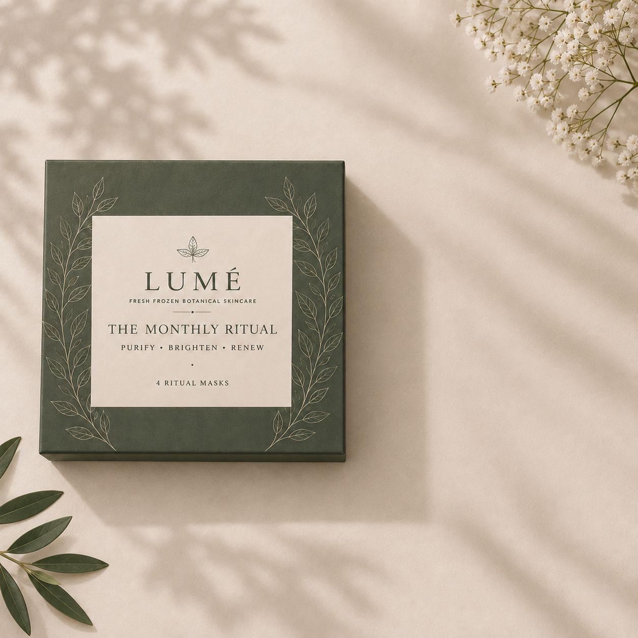 The Monthly Ritual olive box closed, on warm ivory